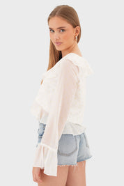 "Ruffle" blus vit