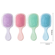 "Portable" small hairbrush lila