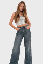 Vaqueros azules con tachuelas